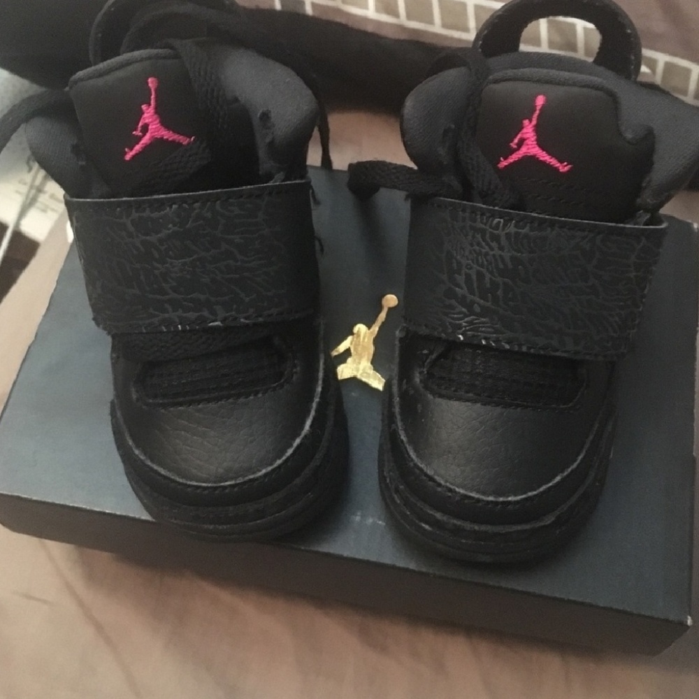 Black and pink Jordans